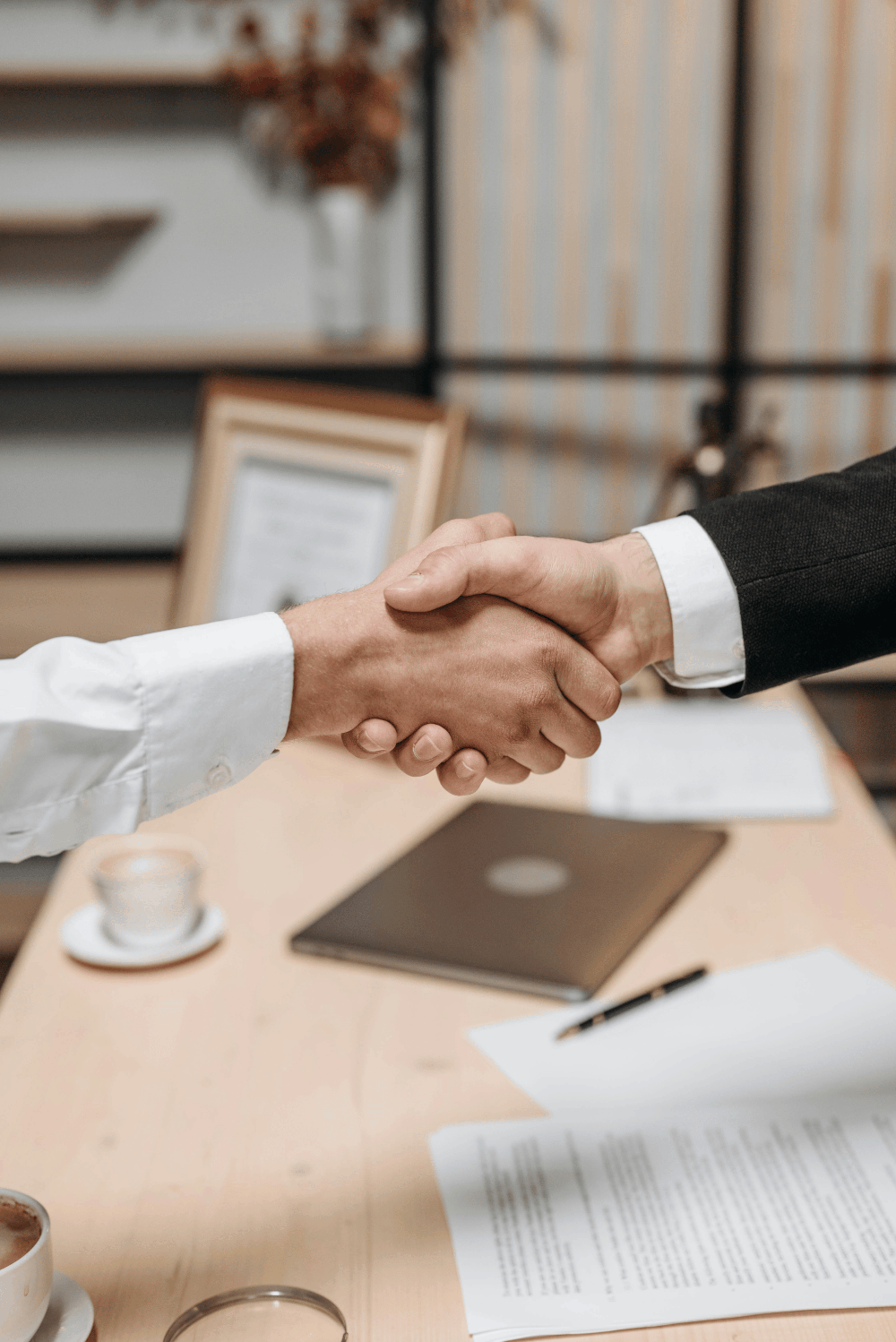 Shaking hands for investment deal